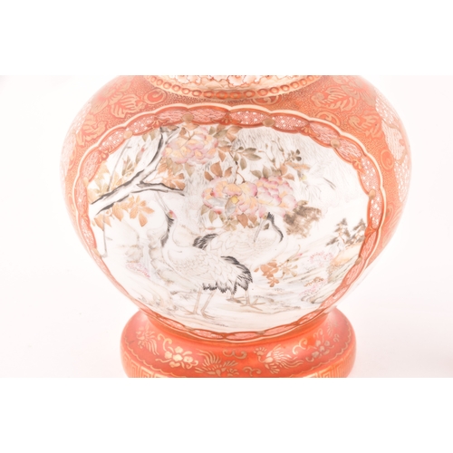 219 - A Meiji period (1868-1912) Japanese Kutani vase, finely painted with panels of birds in landscape se... 