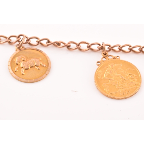 52 - A 9ct rose gold charm bracelet, suspended with three 9ct yellow gold charms, two rose metal charms, ... 