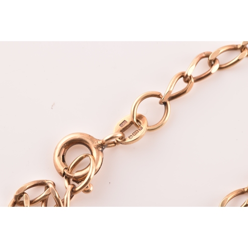 65 - A 9ct yellow gold ingot and chain, hallmarked Birmingham 1977, chain length 41 cm, total weight 20.0... 