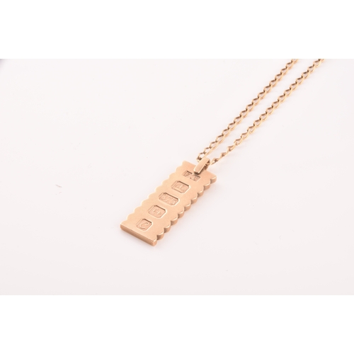 65 - A 9ct yellow gold ingot and chain, hallmarked Birmingham 1977, chain length 41 cm, total weight 20.0... 