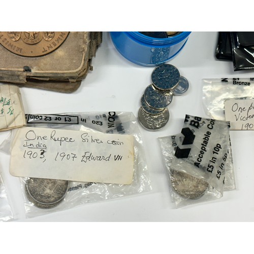 84 - A large collection of assorted silver and other coinage, mostly circulated, including a Victoria 189... 