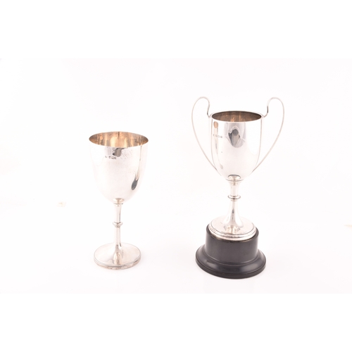 155 - Two silver trophies, a Victorian silver trophy, hallmarked for Sheffield 1893, and a George V silver... 