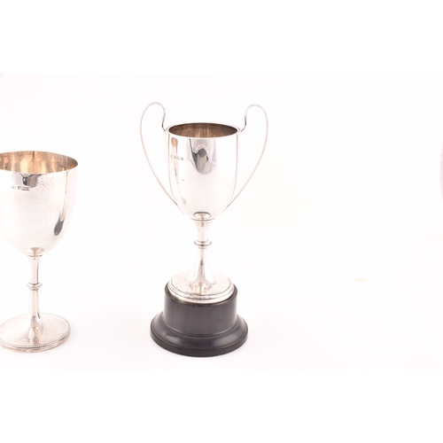 155 - Two silver trophies, a Victorian silver trophy, hallmarked for Sheffield 1893, and a George V silver... 