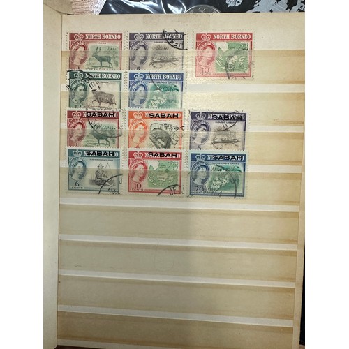 268 - World Stamps. A quantity of albums and material, world stamps including India, 1937 Coronation album... 