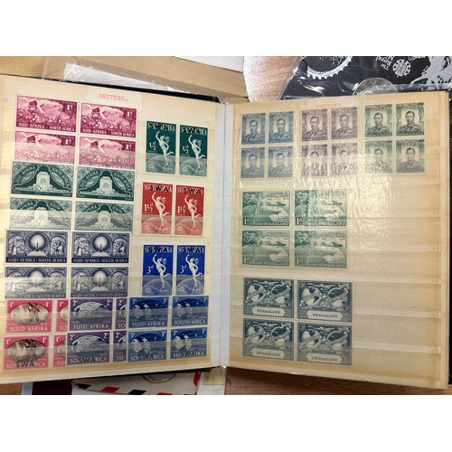 268 - World Stamps. A quantity of albums and material, world stamps including India, 1937 Coronation album... 