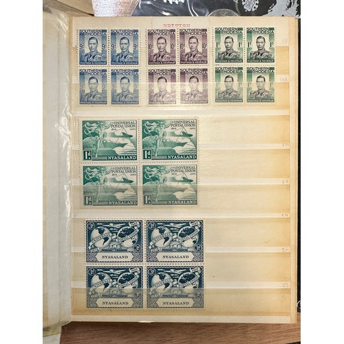 268 - World Stamps. A quantity of albums and material, world stamps including India, 1937 Coronation album... 