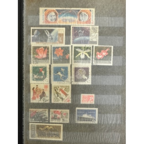 268 - World Stamps. A quantity of albums and material, world stamps including India, 1937 Coronation album... 