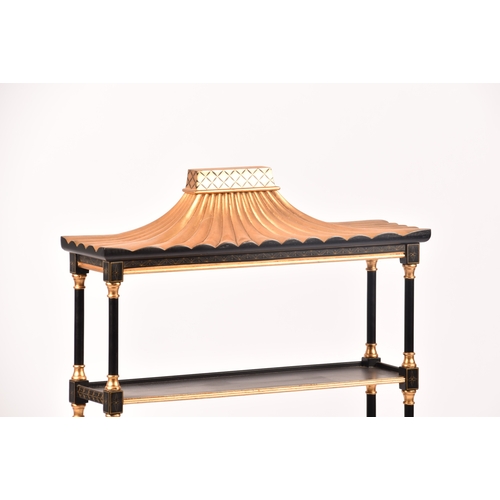 304 - A 20th century oriental design black and gilt wall shelf, the top with pergoda style pediment, three... 