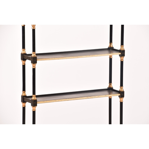 304 - A 20th century oriental design black and gilt wall shelf, the top with pergoda style pediment, three... 