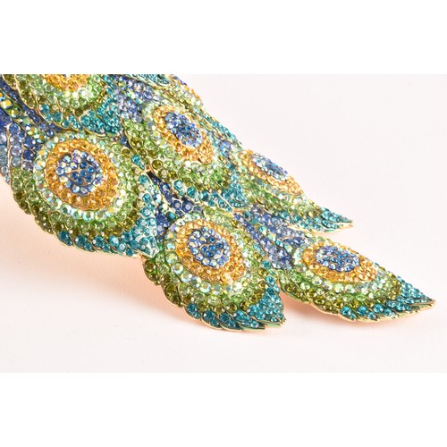 59 - A very large Butler & Wilson peacock shoulder adornment, set with coloured diamante stones on a ... 