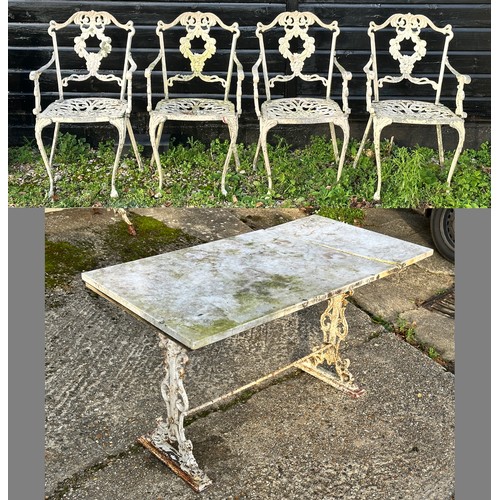 308 - A Victorian cast iron marble topped garden table, together with a set of four cast and painted alumi... 