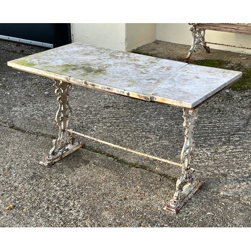 308 - A Victorian cast iron marble topped garden table, together with a set of four cast and painted alumi... 