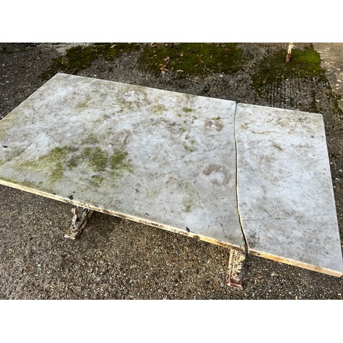 308 - A Victorian cast iron marble topped garden table, together with a set of four cast and painted alumi... 