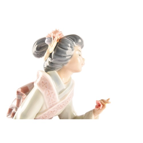 247A - A group of Lladro figures to include a girl with dog, a shepherdess, a Japanese geisha, a Lladro Roy... 