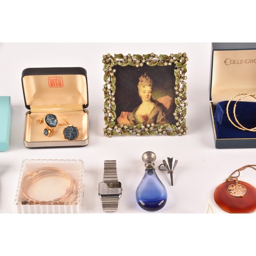 12 - A group of jewellery, including a 18ct yellow gold watch, a 9ct yellow gold sleeper earring and a 18... 