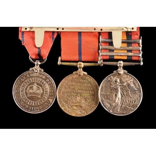 79 - A Boer War and Police three medal group awarded to: 1590 Trooper J. Nash. 1st Battalion Life Guards ... 