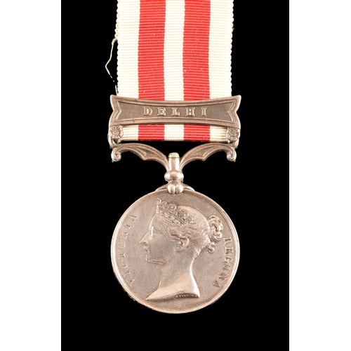 215 - An Indian Mutiny 1857-58 Medal to 3189 Private. Patrick Looby, H.M's. 61st Regiment, with Delhi clas... 