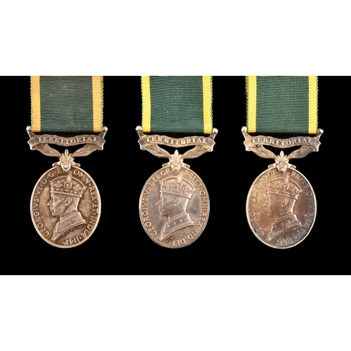 433 - The Territorial Efficiency Medal, For Efficient Service, three to: 1. 1444630 Corporal N. L. Parker,... 