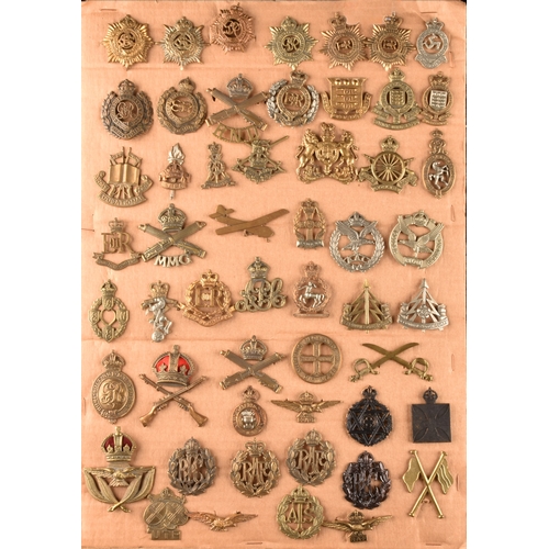 478 - A collection of military cap badges, including: Royal Engineers, Royal Naval Division, Royal Army Se... 