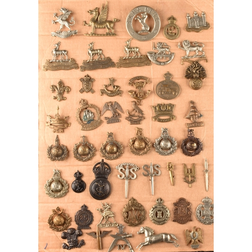 479 - A collection of military cap badges, including Monmouthshire Regiment, Hertfordshire Regiment, The C... 