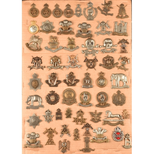 483 - A collection of military cap badges including: First Life Guards, Second Life Guards, Royal Horse Gu... 