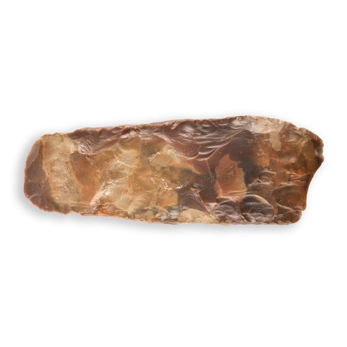 205 - A Stone Age Neolithic carved and chipped expanding form flint axe head, 20.5 cm long.