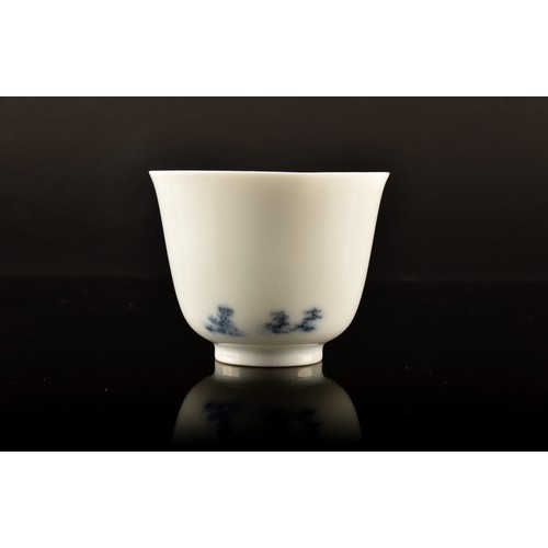 226 - A Chinese Qing Dynasty (Kangxi period 1662-1722), porcelain wine cup, inscribed to the side in under... 