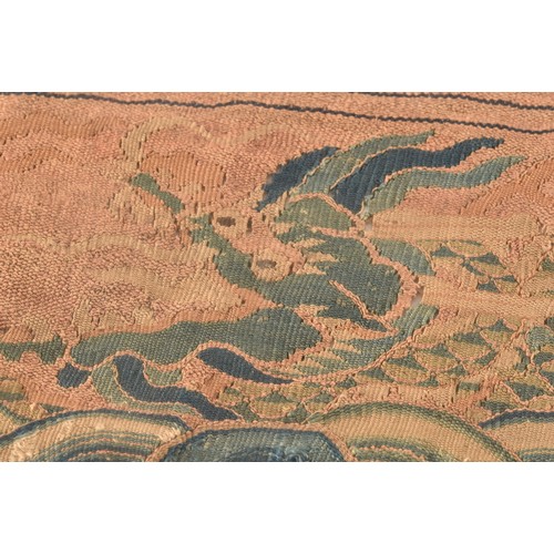 229 - A Chinese late Ming dynasty kesi woven silk panel, depicting mang dragon chasing flaming pearl throu... 