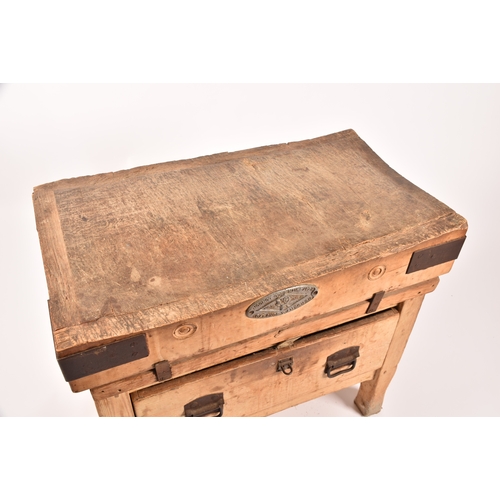 307 - A large Herbert & Sons wooden butchers block on stand, with iron bound corners, supported on a d... 