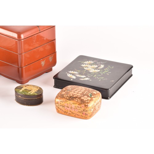 327 - A group of lacquer boxes, including a Japanese red lacquer box and cover, a Victorian box painted wi... 