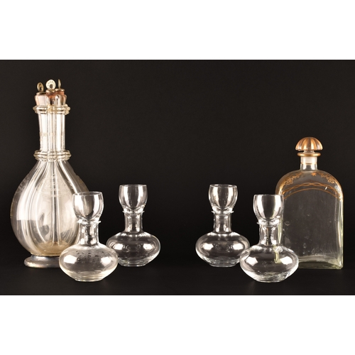 250 - A quadruple glass decanter by Humphrey Taylor of London with individual compartments for curaçao, pe... 