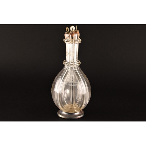 250 - A quadruple glass decanter by Humphrey Taylor of London with individual compartments for curaçao, pe... 