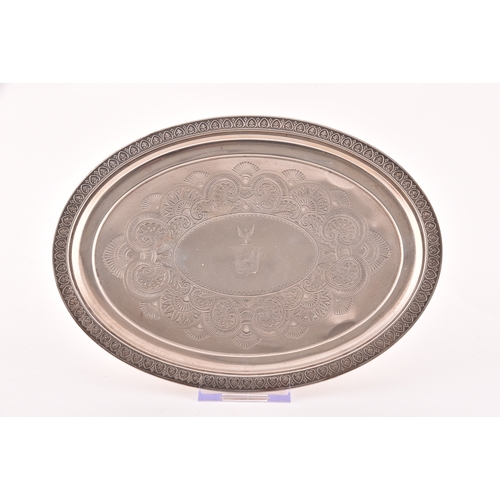 182 - A George IV silver oval shaped tray, Hallmarked Birmingham 1820, with engraved crest and decoration,... 