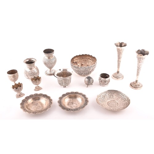 158 - A collection of Burmese white metal objects, including three dishes, a pair of spill vases, a pair o... 