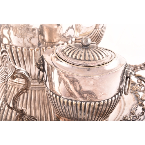 163 - A 19th century silver plated tea set on tray, including a teapot, coffee pot, spirit burner, all wit... 