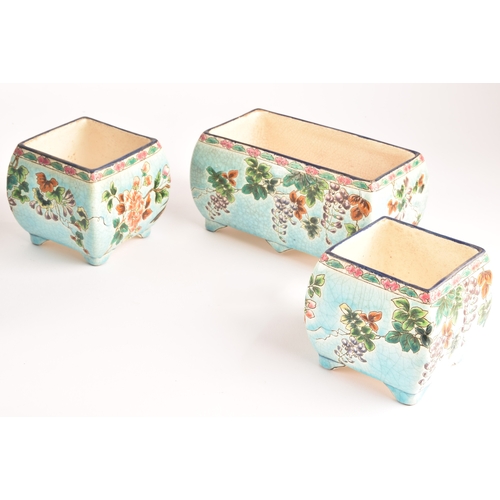 258 - A collection of Art Nouveau Longwy French porcelain, including a letter case, three planters, a bask... 