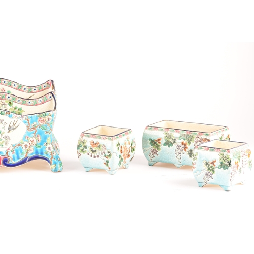 258 - A collection of Art Nouveau Longwy French porcelain, including a letter case, three planters, a bask... 