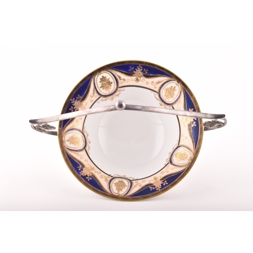 164 - A blue and white porcelain bon bon dish in a Art Nouveau style silver plated carrier, bowl measures ... 