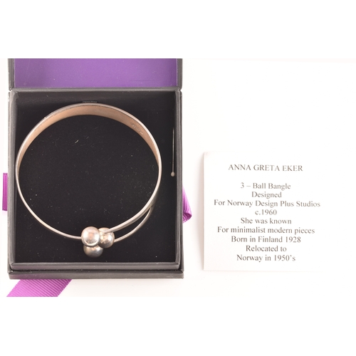 100 - A 1960's Norwegian silver three ball bangle by Anna Greta Eker, 7cm diameter.