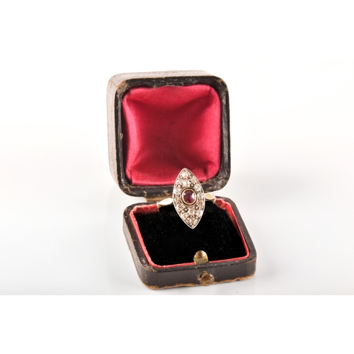 101 - A 18ct yellow gold and silver marquise cluster ring, set to centre with a oval old cut ruby with an ... 