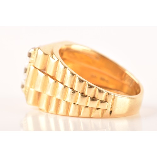 85 - An 18ct yellow gold signet ring, set with nine round brilliant cut diamonds with a combined approxim... 