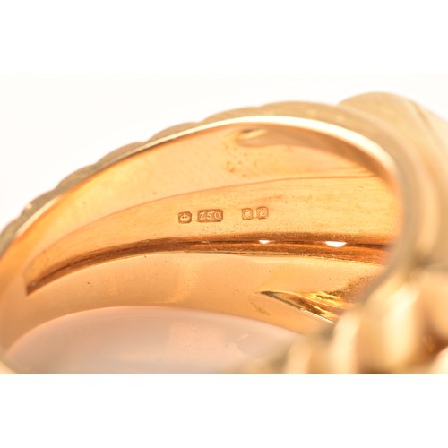 85 - An 18ct yellow gold signet ring, set with nine round brilliant cut diamonds with a combined approxim... 