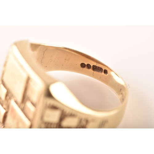 104 - A 9ct yellow gold signet ring, engraved with initials, textured detail, size M.