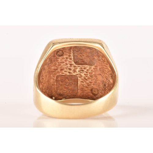 104 - A 9ct yellow gold signet ring, engraved with initials, textured detail, size M.