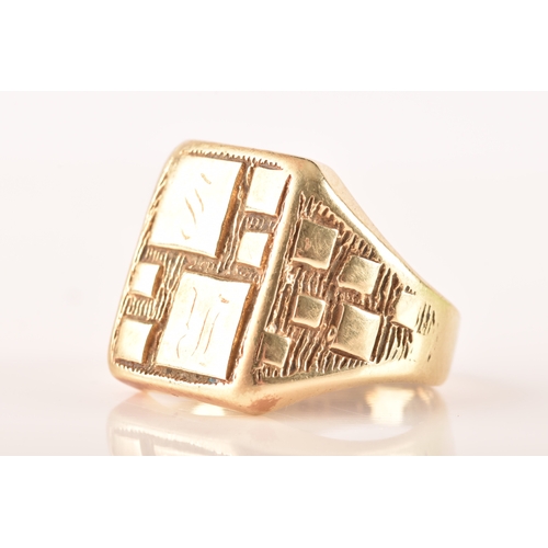 104 - A 9ct yellow gold signet ring, engraved with initials, textured detail, size M.