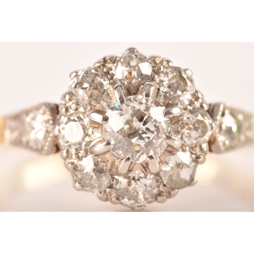 84 - An Edwardian 18ct yellow gold and platinum diamond coronet cluster, set to centre with an old mine d... 