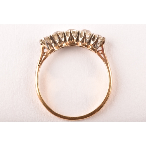 106 - An early 20th century 18ct yellow gold and platinum diamond five stone ring, set with five round old... 