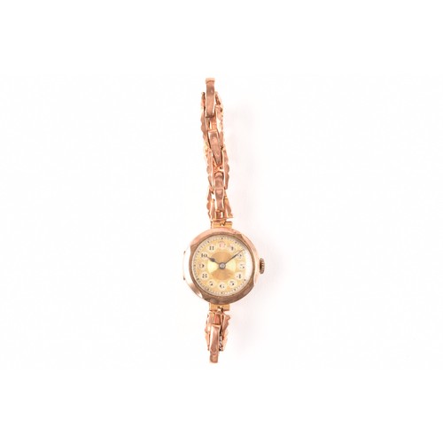 136 - A ladies 9ct yellow gold mechanical wristwatch, with gilt dial, 9ct gold case and a 9ct rose gold fl... 