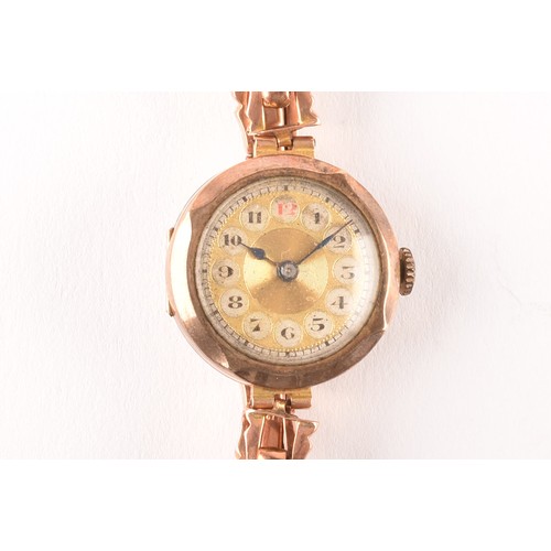 136 - A ladies 9ct yellow gold mechanical wristwatch, with gilt dial, 9ct gold case and a 9ct rose gold fl... 