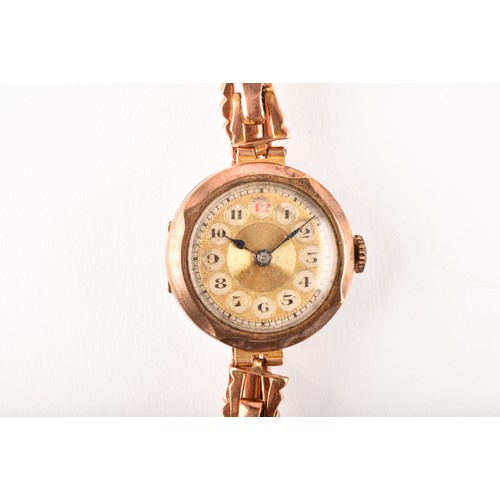 136 - A ladies 9ct yellow gold mechanical wristwatch, with gilt dial, 9ct gold case and a 9ct rose gold fl... 